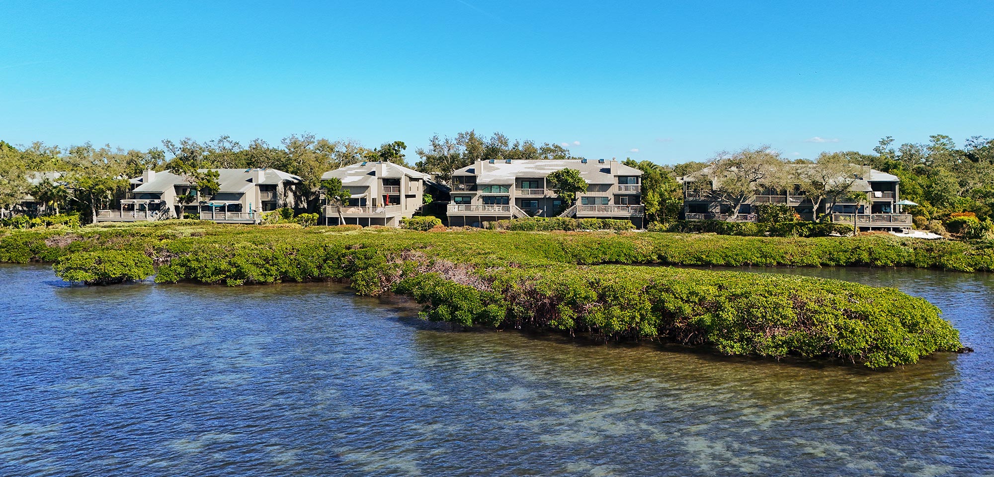 Aerial view of Treehouses condos overlooking mangroves and Intracoastal Waterway